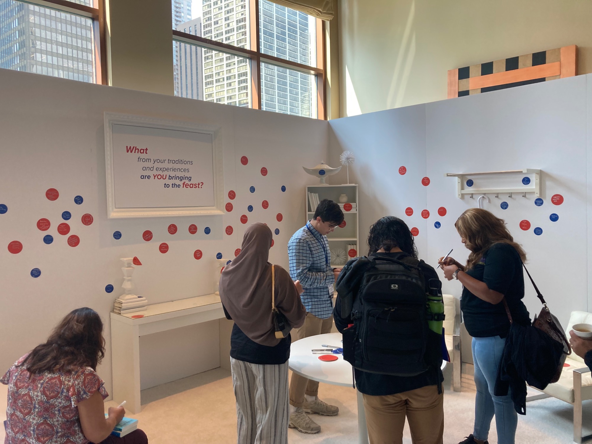 Students answering the prompt, "What from your traditions and experiences are you bringing to the feast?"